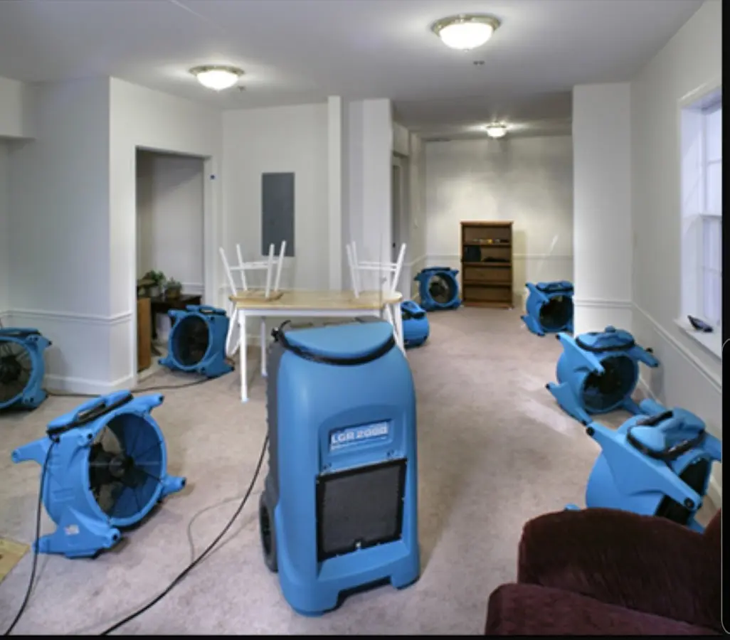 Air movers and dehumidifier setup for Water Damage Restoration in Webb City